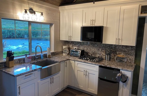 Dubois Cabin | Remodeled Cabin on 40 private acres of Wind River frontage with R/V hookup.n