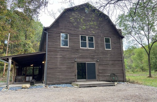 Langsville House | Restored 100-year-old Barn House in Private Forest. Perfect for gatherings.