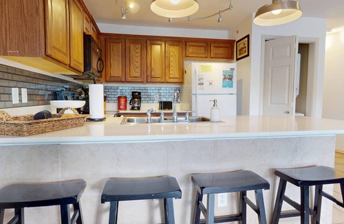 New Braunfels Condo | River City Resorts: WW J203 *Guadalupe River, Free Tubes with Rental*