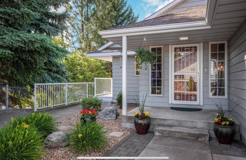 Post Falls House | River's Edge Oasis, private dock, 2 kitchens, pool table, dog friendly!