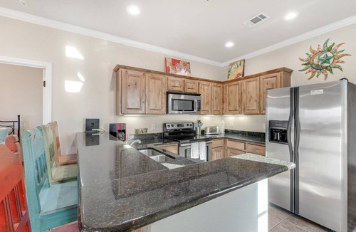 Gruene Condo | River view condo with a pool, washer/dryer, central AC - snowbirds welcome