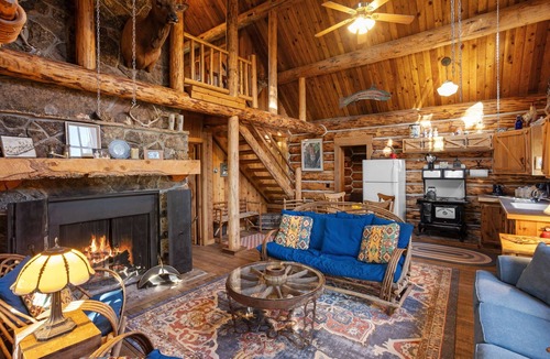 Livingston House | Riverside log cabin, pool, pickle ball court, ultimate mountain experience