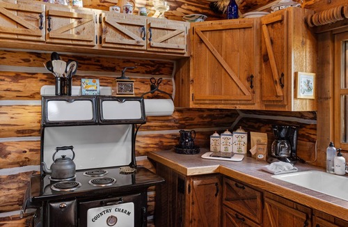Livingston House | Riverside log cabin, pool, pickle ball court, ultimate mountain experience