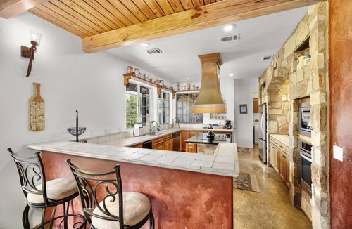 Wimberley House | Rock 'n' Wood - Pool, 3 Living Quarters, 2 Hot Tubs, Sleeps 13, Minutes to Downtown Wimberley!