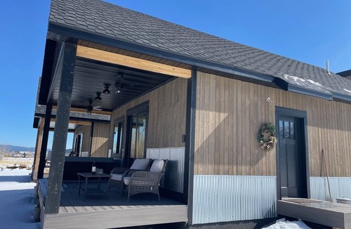 Anaconda Cottage | Romantic River Front Cottage at Old Works Golf Course! Hot Tub and Sauna!