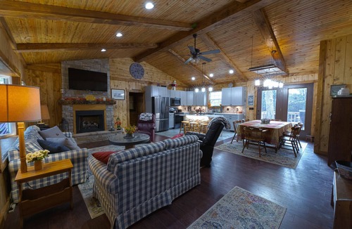 Winchester Cabin | Rustic Cabin with modern amenities and 1 acre stocked Fishing Lake !