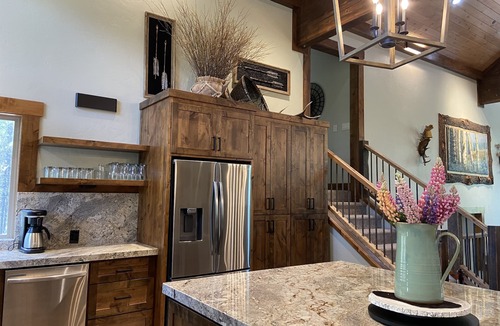 West Yellowstone Cabin | RUSTIC Elegance ELEVATED! Hot Tub and more! Only 10 Minutes from Yellowstone NP!