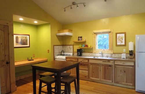 Whitefish Cottage | Secret Garden, king bed Cottage