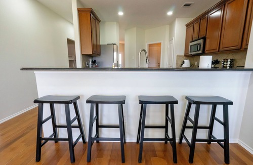 McKinney House | Serene 4-bedroom house with BBQ, 5-TVs in McKinney facing Park & Pond sleep 12