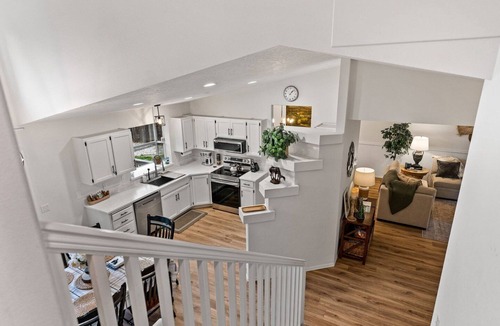 Post Falls House | Silverwood CDA Family Getaway Game Room Air Hockey Ping Pong Treehouse Yard AC