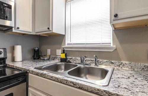 Bartlesville Apartment | Sleek 1 Bd Remodeled Apt. In the heart of Downtown