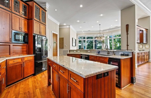Barium Springs Villa | Sleeps 22 on Lake Norman, Island Retreat with Private Dock, Hot Tub, Game Rooms, Elevator, Full Bar, 2+ Acres of Lakefront Paradise, Fire Pit, Covered Dock, Kayaks, Perfect for Reunions, Corporate Retreats and Large Group Getaways