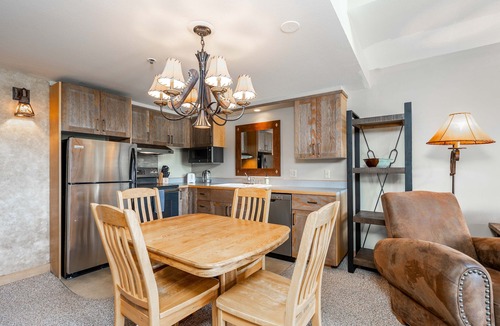 Big Sky Condo | Slope side family fun condo with shared pool and hot tub