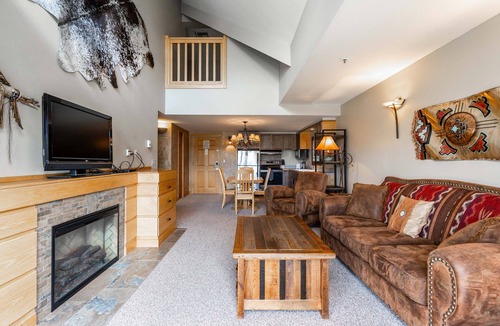 Big Sky Condo | Slope side family fun condo with shared pool and hot tub