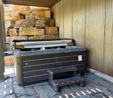 Whitefish House | Snowghost Den True Ski In Ski Out Home Sleeps 9 with 3 Bedrooms 2 and a half Bathrooms and Private Hot Tub