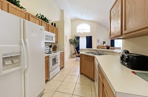 Haines City Villa | South facing pool home with games room - gated community