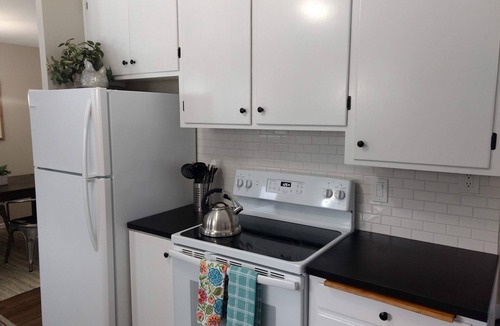 Moran Prairie House | South Hill's Blue Bungalow, A Charming Single Story Home with Lvl 2 EV Chrgr
