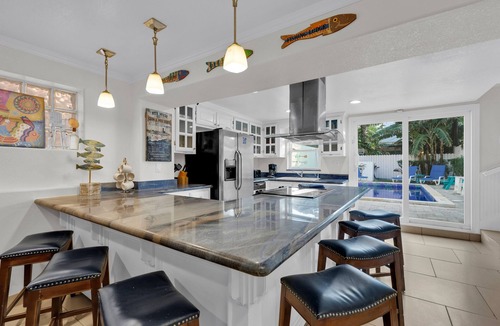 South Padre Island House | Southern Comfort: Beautiful Beach House with Heated Pool. Dog-Friendly and Steps to Beach!