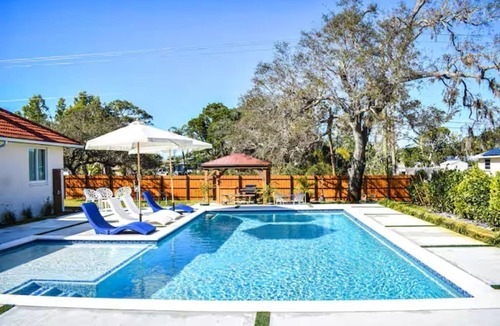Bonita Shores House | Spacious 4 Bedroom Home in Bonita Springs Heated Pool 5 Minutes from Beach