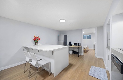 Montgomery House | Spacious basement 2 bedroom suite with private kitchenette and bathroom