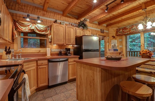 Smoky Mountains Cabin | Spacious creekside oasis with private hot tub, pool table, W/D, & fireplace