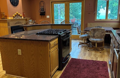 Ortonville House | Spacious home with a large deck and ample space for beautiful sunset viewing!