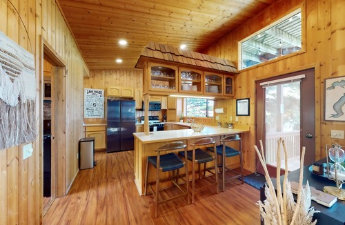 Hope House | Spacious lakefront home with private hot tub, dock, boat lift, views & game room