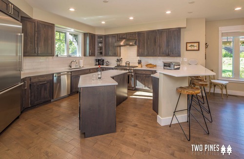 Big Sky House | Stunning and Spacious Mid-Century Town Center Home! Private Patio with Hot Tub!