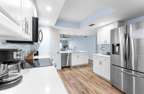Port Canaveral Condo | Stunning Beach Beauty - Chef's Kitchen - Near Port w/Pool!