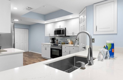 Port Canaveral Condo | Stunning Beach Beauty - Chef's Kitchen - Near Port w/Pool!