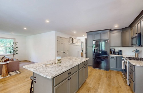 Bumpass House | Stunning lakefront retreat w/firepit, game room, & water views