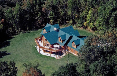 Homerville Cabin | Stunning Log Cabin on 65 Acres with a new swimming pool