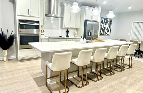 Glen Allen House | Stylish 4BR/2.5BA home for up to 10 guests with kitchen, patio, and workspace.