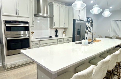 Glen Allen House | Stylish 4BR/2.5BA home for up to 10 guests with kitchen, patio, and workspace.