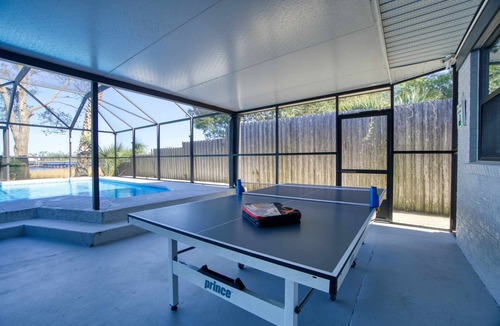 Riverview House | Super Mario's Riverside Hideaway: Unique Family Fun with Pool & Games
