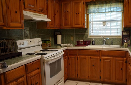Rio Hondo Cottage | Texas themed cabin with a Shared fishing pier Not waterfront