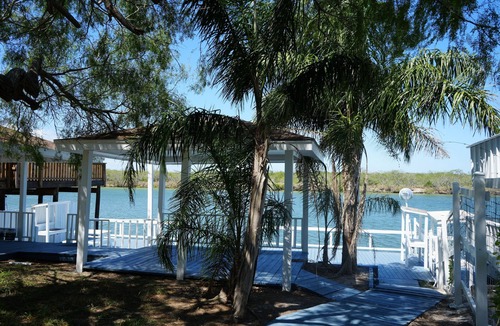 Rio Hondo Cottage | Texas themed cabin with a Shared fishing pier Not waterfront