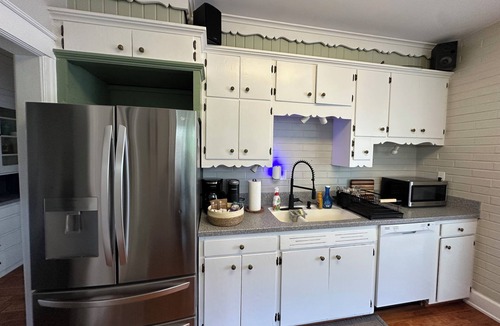 Cedar Rapids House | The Grand Rapidian- Historic 4-bedroom House with Fenced in Yard! Pet Friendly!