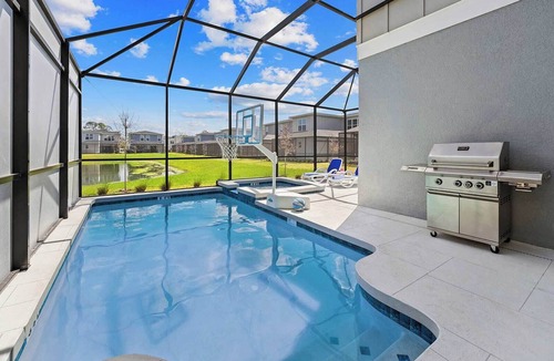 Florida Center House | The Marvelous | Brand NEW home w toy theme RM, pool, grand LR/DR, near Universal