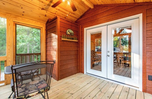 Nevis House | Tiny house nestled in the woods with lake view. Pets Accepted!