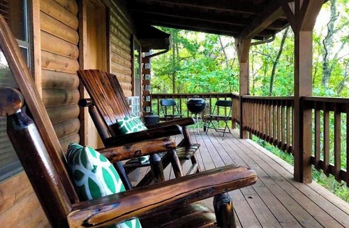 Eureka Springs Cabin | Tranquil Cabin- Perched on Mountain Top boasting jacuzzi for two and expansive deck with views! Trail & Cave on Property!
