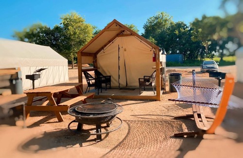 Prairie Lea RV Rental | Tranquil Fully-Equipped Safari Tent near Kingsbury, Texas - Idyllic Glamping Retreat on the San Marcos River