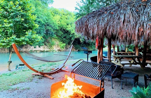 Prairie Lea RV Rental | Tranquil Fully-Equipped Safari Tent near Kingsbury, Texas - Idyllic Glamping Retreat on the San Marcos River