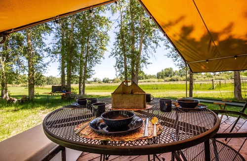 Bozeman RV Rental | TroutChasers Glamping Tent - Crackling Fire, Fresh Air, Fly Fishing