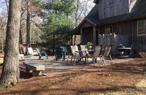 East Falmouth House | Tucked away in a private wooded setting