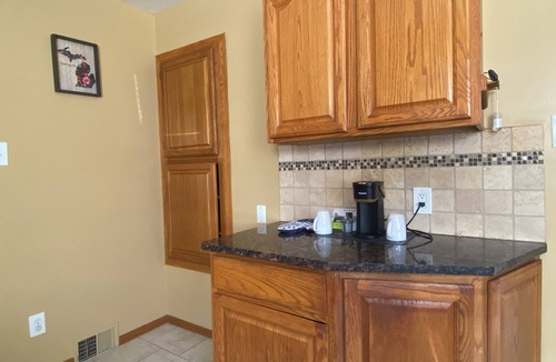 Redford House | Updated brick ranch with lots of space.