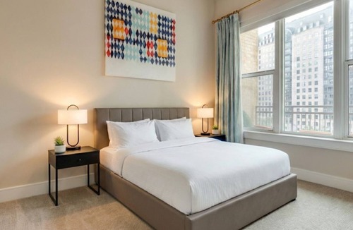 Uptown Apartment | Uptown Two Bedroom Suite with Full Kitchen & Walkable Charm