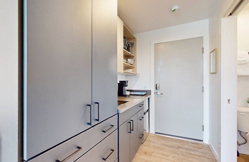 Old Ballard Apartment | Urban studio unit with patio views, shared lounge space and dedicated workspace
