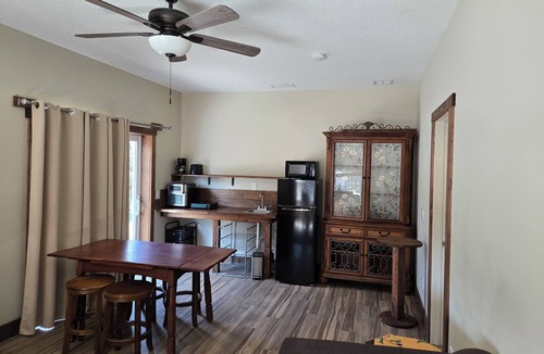 Fernandina Beach Apartment | Walk to the beach. Two room suite & shaded deck with sunset views over greenway.