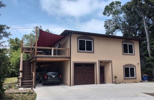Fernandina Beach Apartment | Walk to the beach. Two room suite & shaded deck with sunset views over greenway.